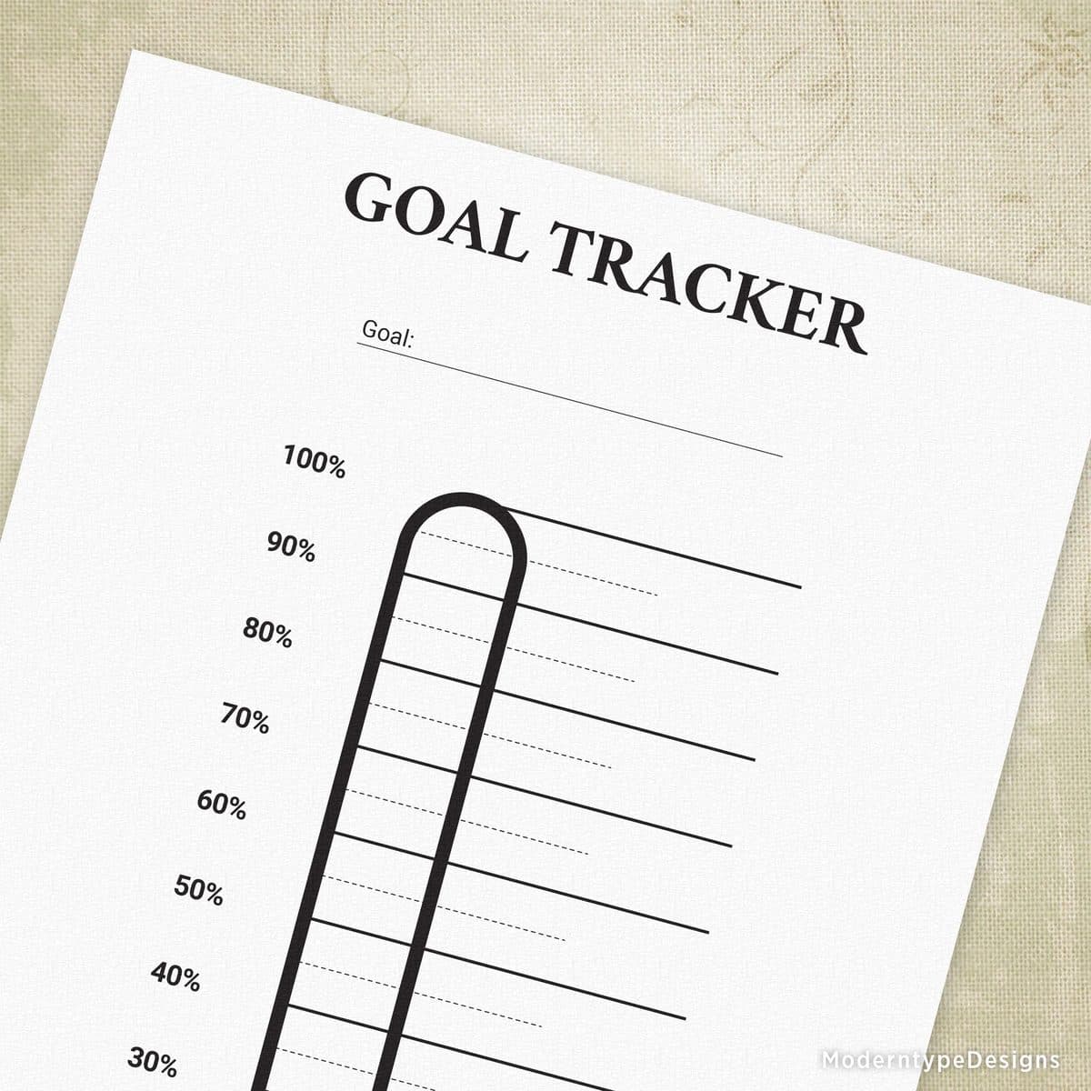 A printable goal-tracker thermometer chart with percentage markings from 30% to 100%, used to visualize progress toward a target score.